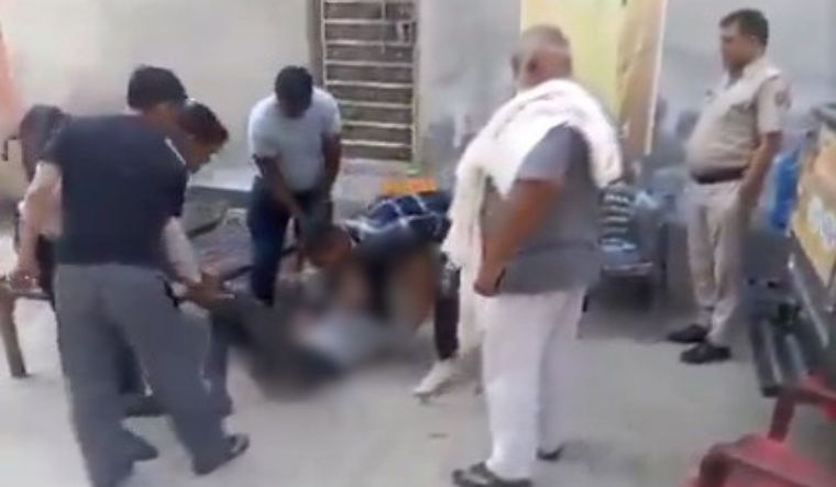 The viral video dated April 1 shows a group of men pinning the victim down as Bittu Bajrangi beats him up at least four times